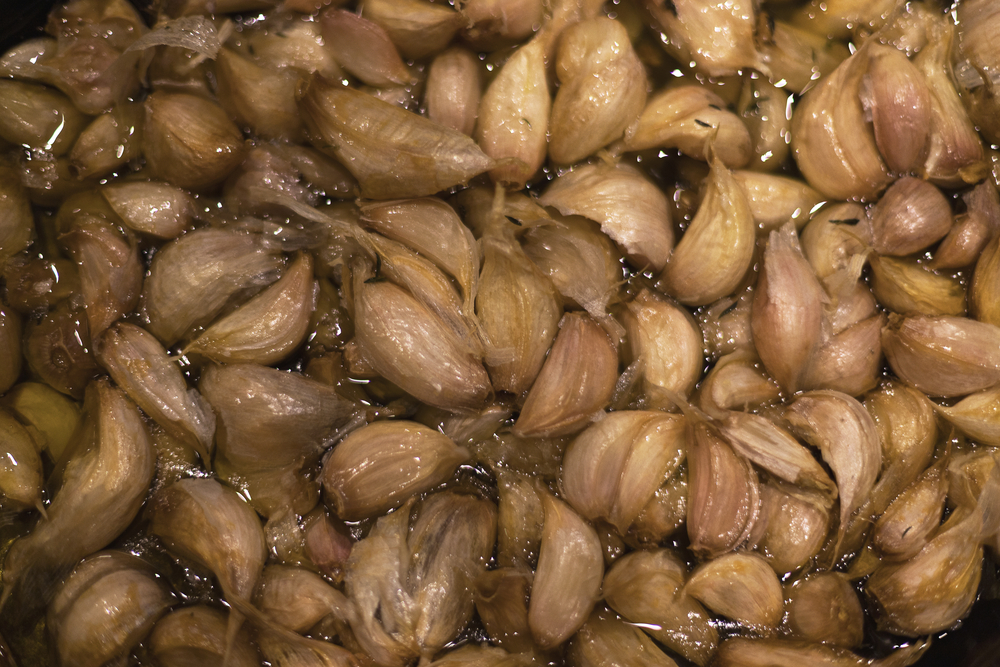 garlic cloves confit in olive oil.