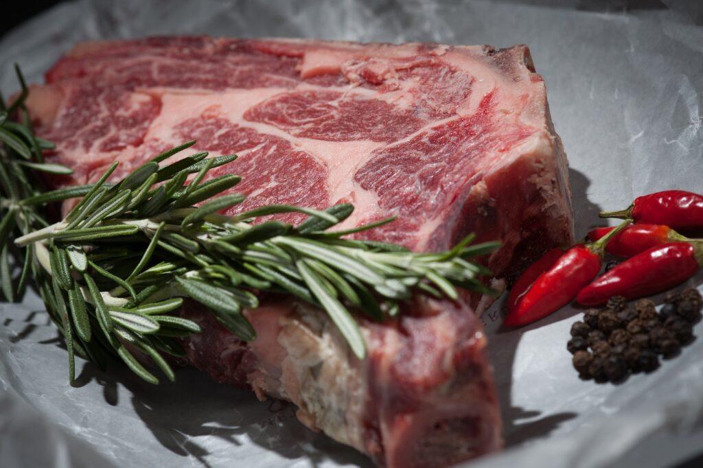 cooking steak on a pellet grill